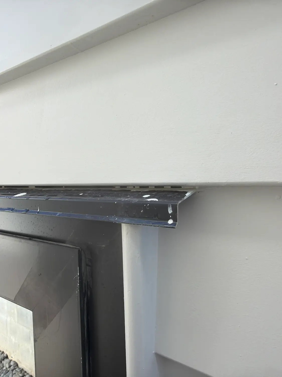 Head-flashing termination detail identified during new-build exterior inspection